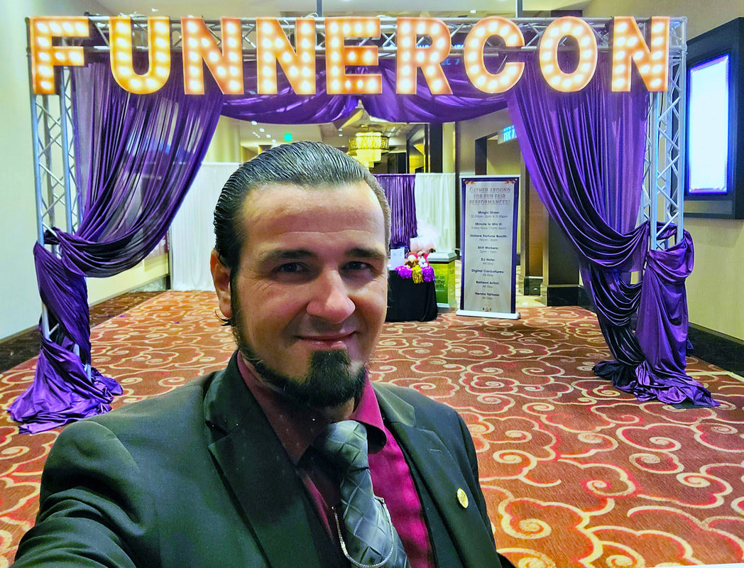 Corporate magician Matthew King in front of FUNNERCON sign at Harrahs Rincon casino for magic show.