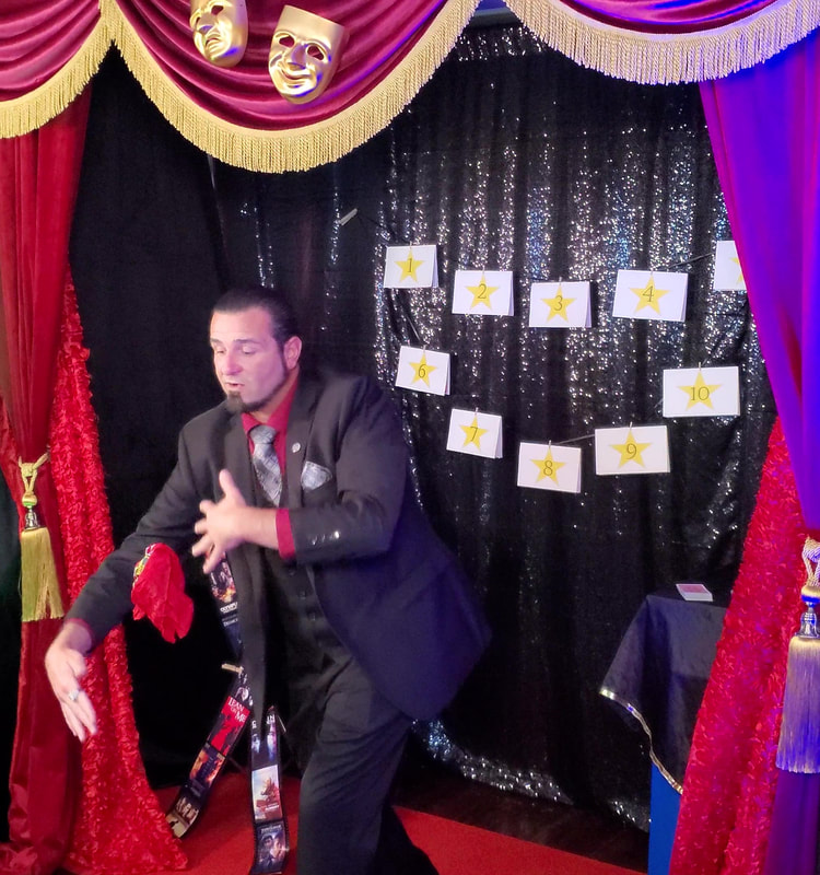 San Diego Magician Matthew King in corporate virtual magic show making a handkerchief float